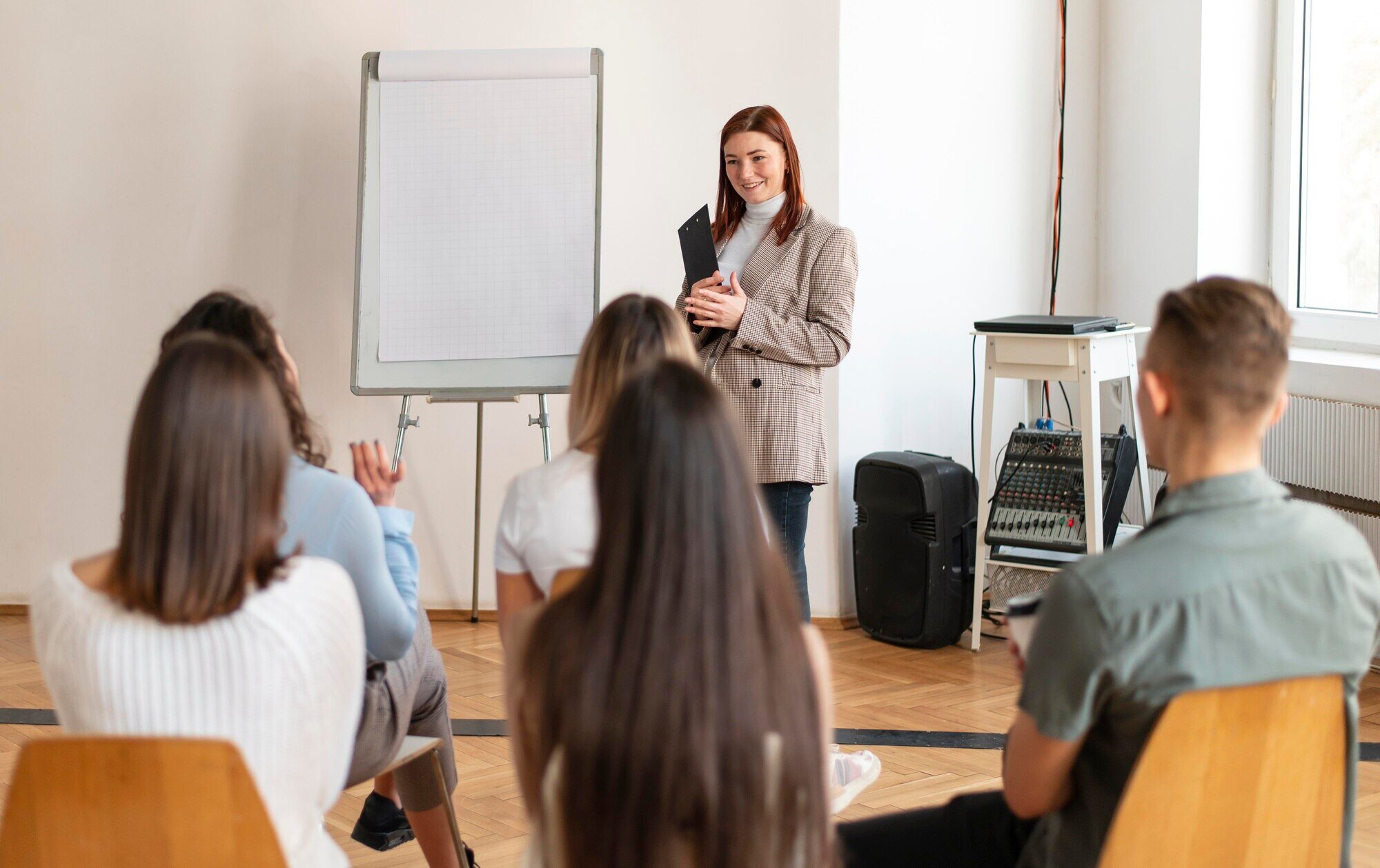 Woman Leading Therapy Meeting